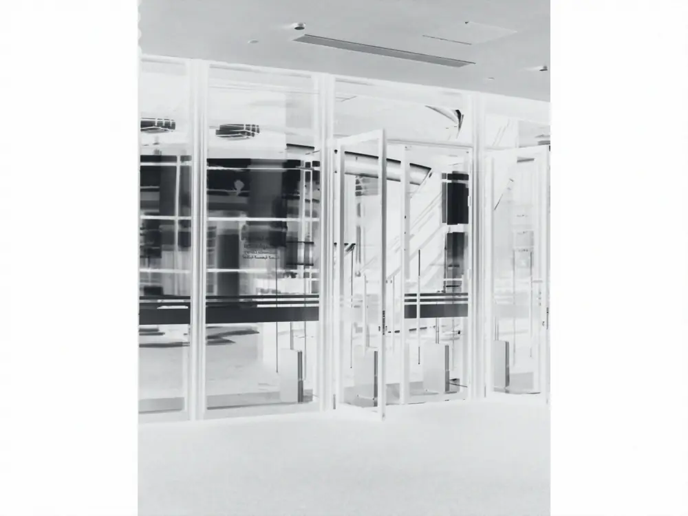 Glass entrance doors in a commercial lobby